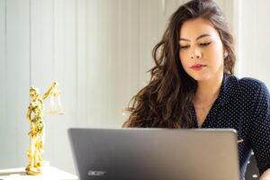 Female attorney working on laptop 